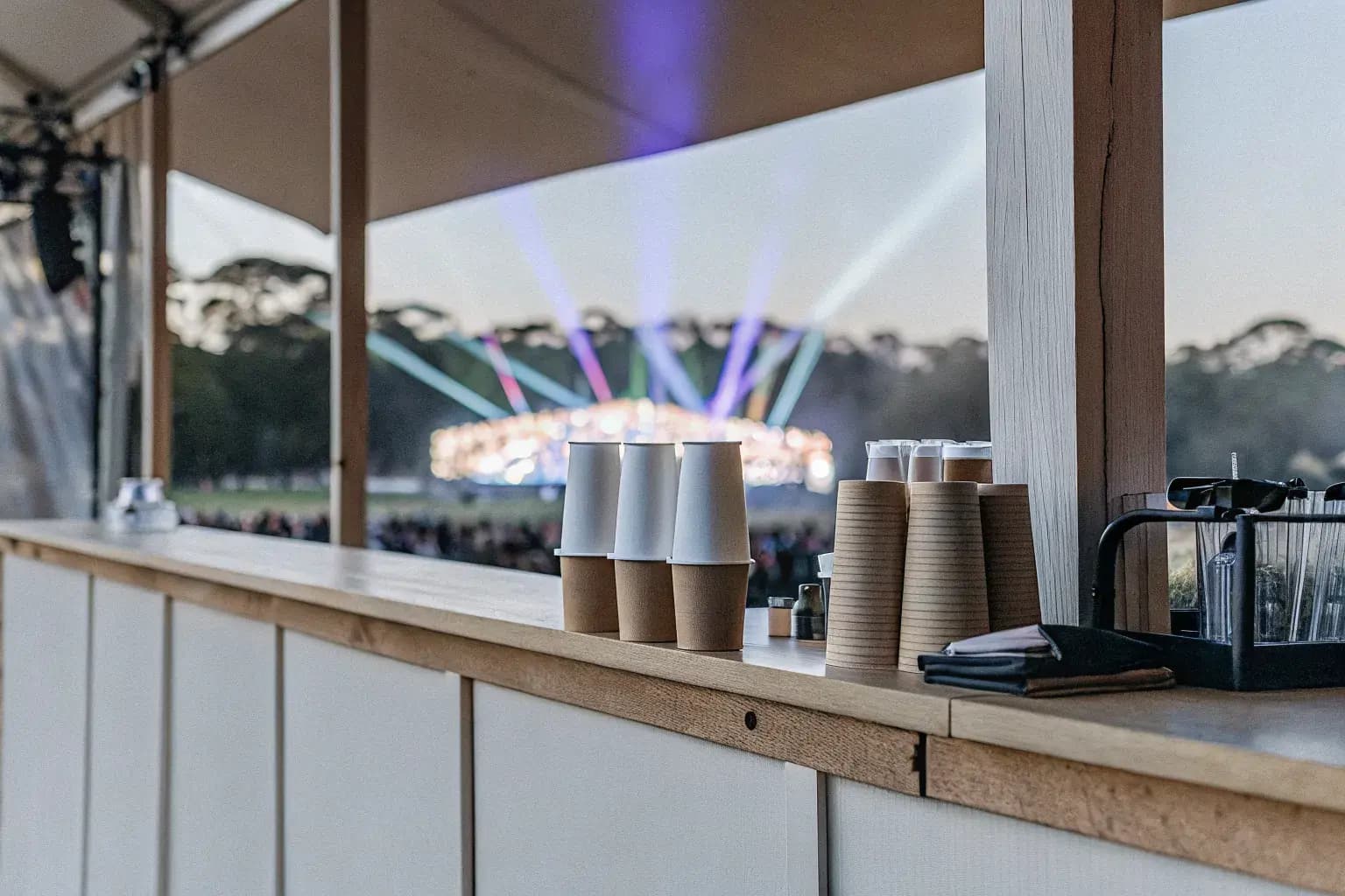 Concert venue concession stand with compostable cups and serviceware, representing the concert venue sustainability program